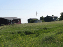 Rear view of homes in the Milk's Camp housing area.