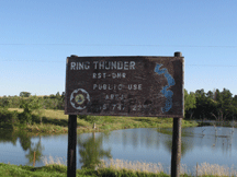 Ring Thunder Public Access lake area sign.