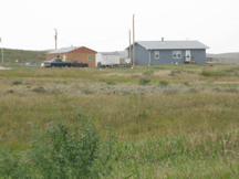 Homes in tribal housing area in Upper Cut Meat.